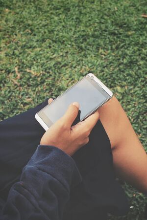 Woman using smart phoneの写真素材