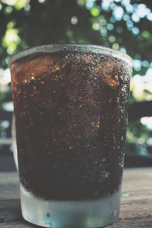 Cola with ice cubes