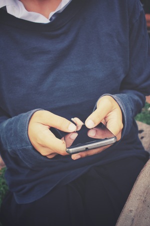 Woman using smart phoneの写真素材