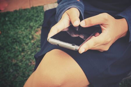 Woman using smart phoneの写真素材