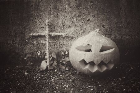 Halloween pumpkin with crossの写真素材