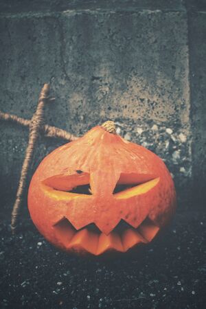 Halloween pumpkin with crossの写真素材