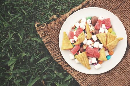 Mixed halloween candy with chocolate and marshmallowの写真素材