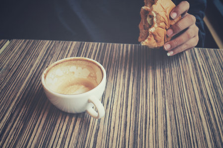 Hamburger with coffee cup
