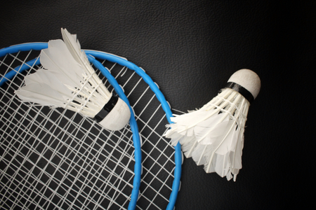 Shuttlecocks with badminton racketの写真素材