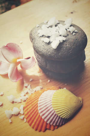 Spa set of stones and salt with flowerの写真素材