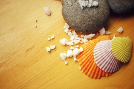 Spa set of stones and salt with shellの写真素材