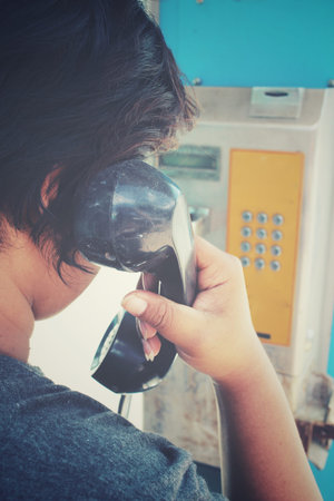 Woman talking with telephone