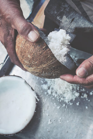 Coconut with hands