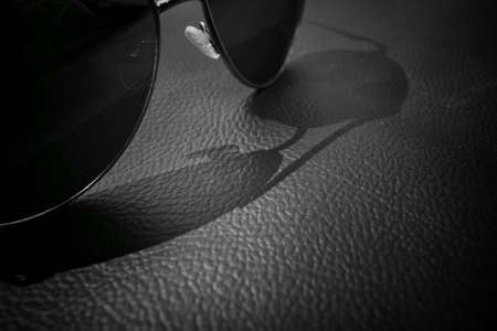 Sun glasses with shadowの写真素材