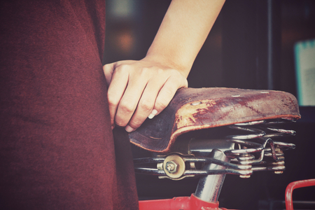 Hand with bicycleの写真素材