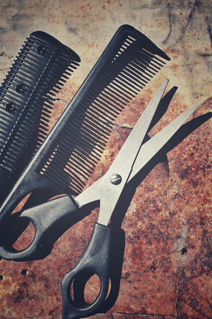 Hair cutting shears and comb with shadowの写真素材