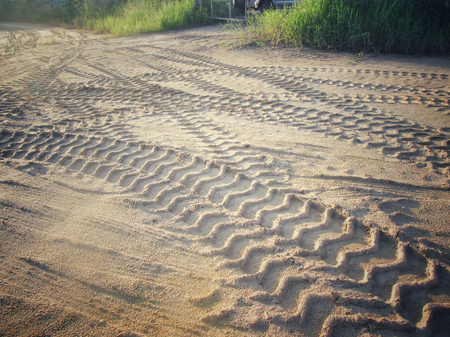 Wheel tracks on the soil.の写真素材