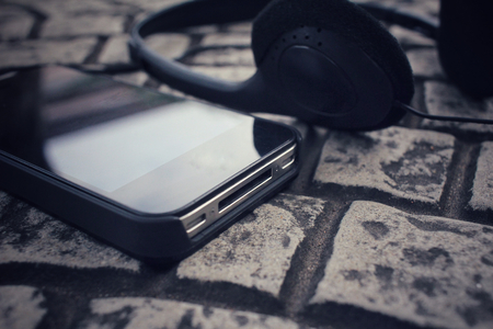 Earphone with smart phoneの写真素材