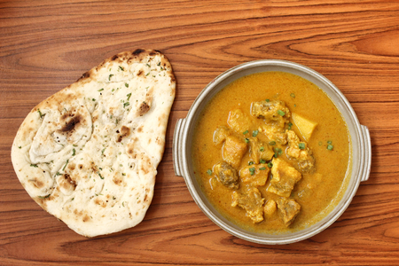 Indian naan bread with curryの写真素材