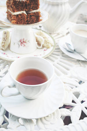 Carrot cake with hot teaの写真素材