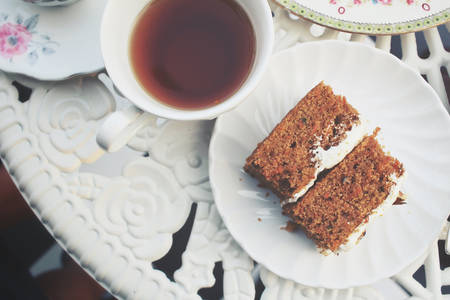Carrot cake with hot teaの写真素材