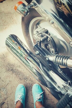 Sneakers with motorcycleの写真素材
