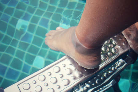 Selfie of feet with poolの写真素材