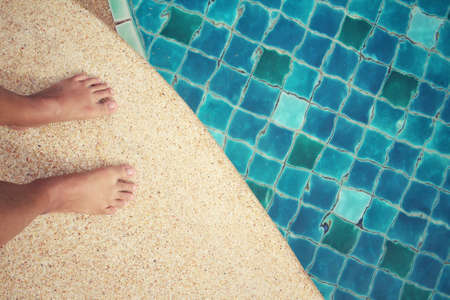 Selfie of feet with poolの写真素材