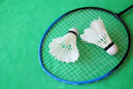 Shuttlecocks with badminton racket.の写真素材