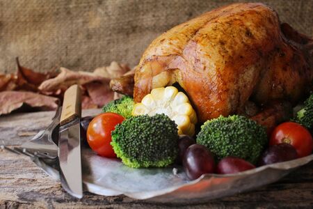 Roasted turkey with vegetables for thanksgiving dayの写真素材