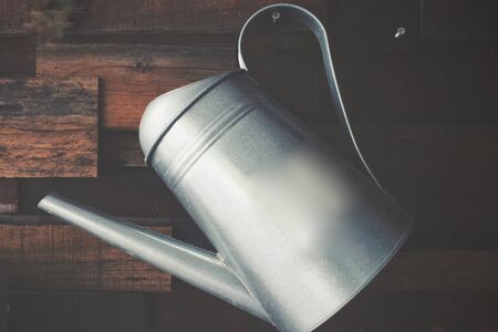 Vintage watering canの写真素材