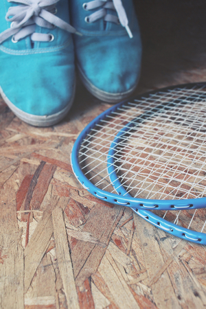 Sneakers with badminton racket.の写真素材