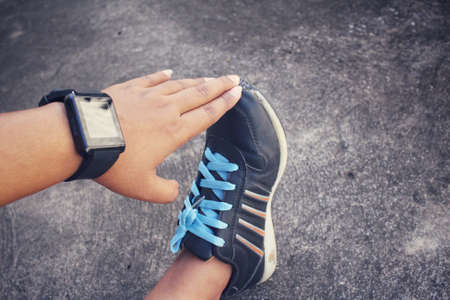 Woman exercises with smartwatchの写真素材