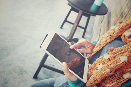 Young woman using tablet