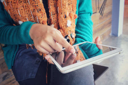 Young woman using tabletの写真素材