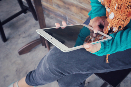 Young woman using tabletの写真素材
