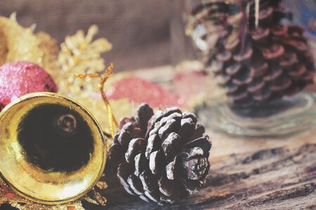 Christmas decoration with pine cone in jarの写真素材