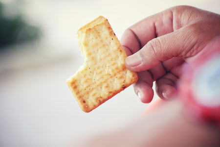 Crackers on handの写真素材