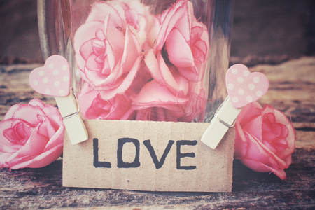 Vintage roses on the jar with loveの写真素材