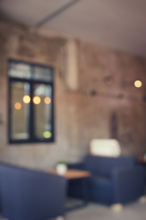 Blurred of vintage black leather sofaの写真素材