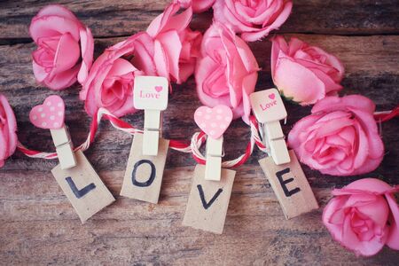 Word LOVE with rosesの写真素材