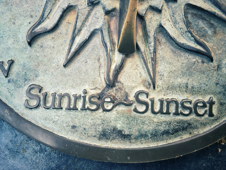 Old sun clock dial - Vintage sundialの写真素材