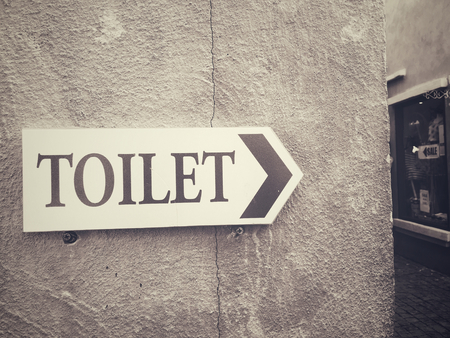 Vintage toilet signの写真素材
