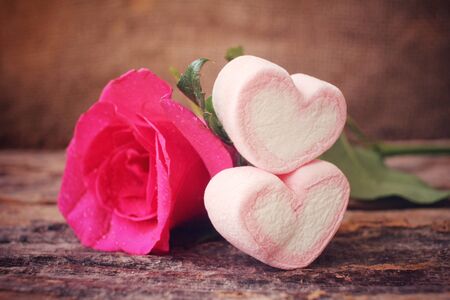 Red roses with heart pink marshmallow for valentine's dayの写真素材