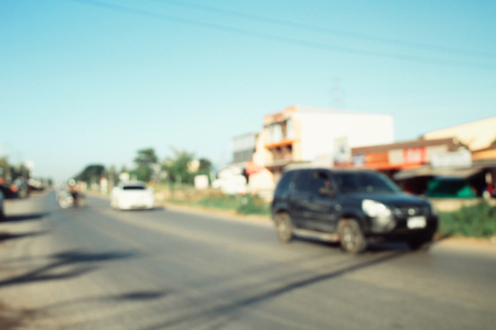 blurred of car on roadの写真素材