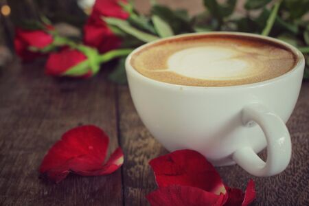 Latte art coffee with red road for valentine dayの写真素材