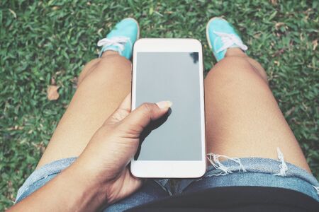 Woman using smart phoneの写真素材