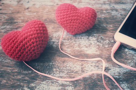 Earphone with smart phone and heartの写真素材