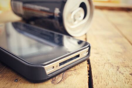 Smart phone with aluminum canの写真素材
