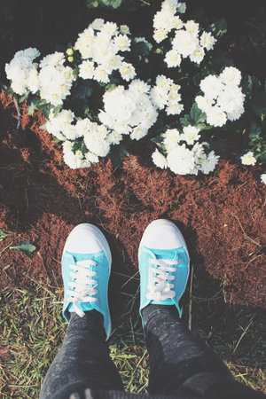Selfie of shoes with flowers