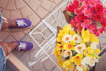 Selfie of shoes with artificial flowersの写真素材