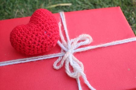 Gift box with red heart for valentine dayの写真素材