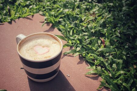Hot chocolate with heart pink marshmallow for valentine's dayの写真素材