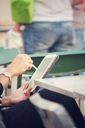 Woman using smart phoneの写真素材